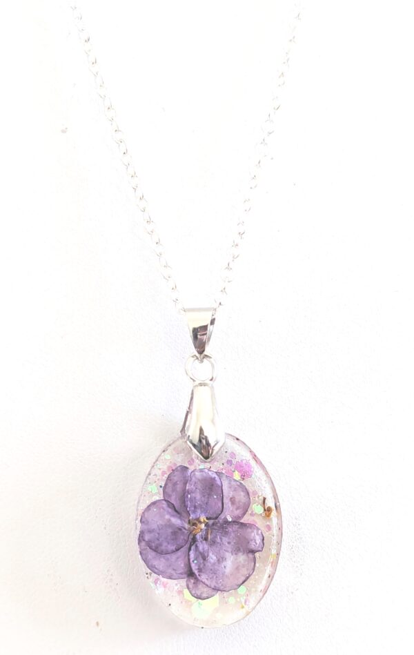 Robs Silver Spook African Violet Flower Preserved In A Resin Necklace