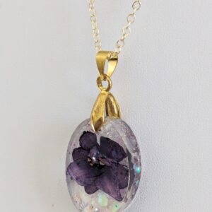 The King African Violet Preserved In A Resin Necklace